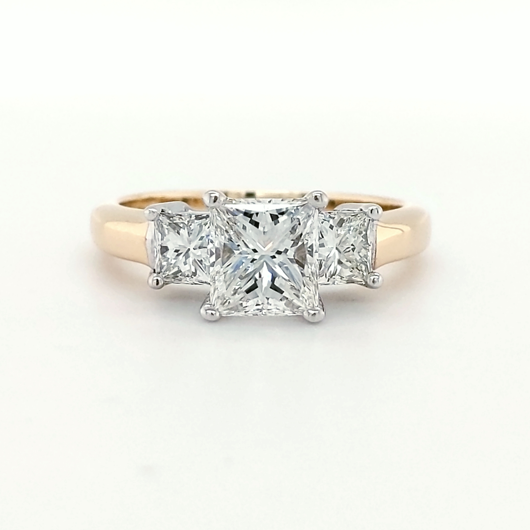 18K Two-Tone 3 stone Princess Cut Diamond ring with 1.50ct F-VS2 center stone & .80ctw side diamonds - finger size 7 - QA&E $16,940